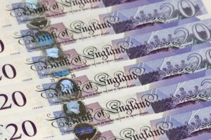 GBP/USD slides to over three-week low, additional beneath 1.2100 trace on stronger USD