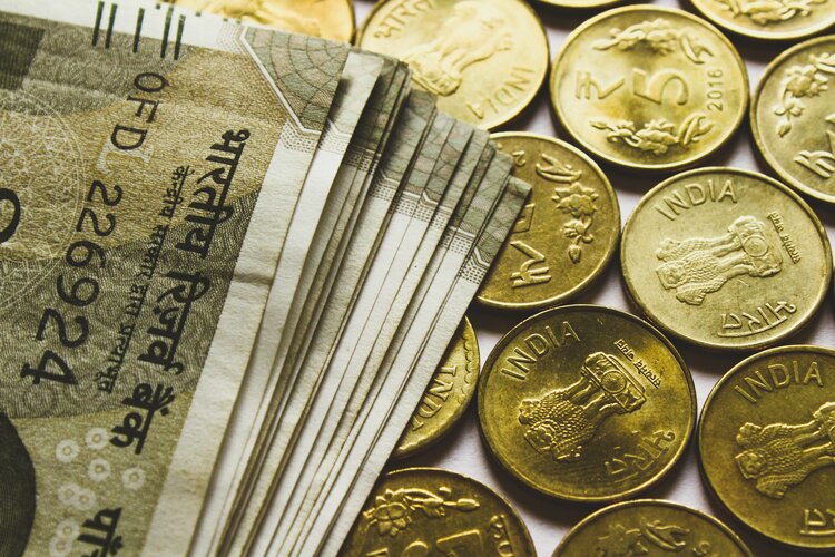 USD/INR depreciates as Indian Rupee receives give a steal to on index inclusion