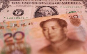 Yuan creeps better as greenback wobbles forward of Jackson Hole