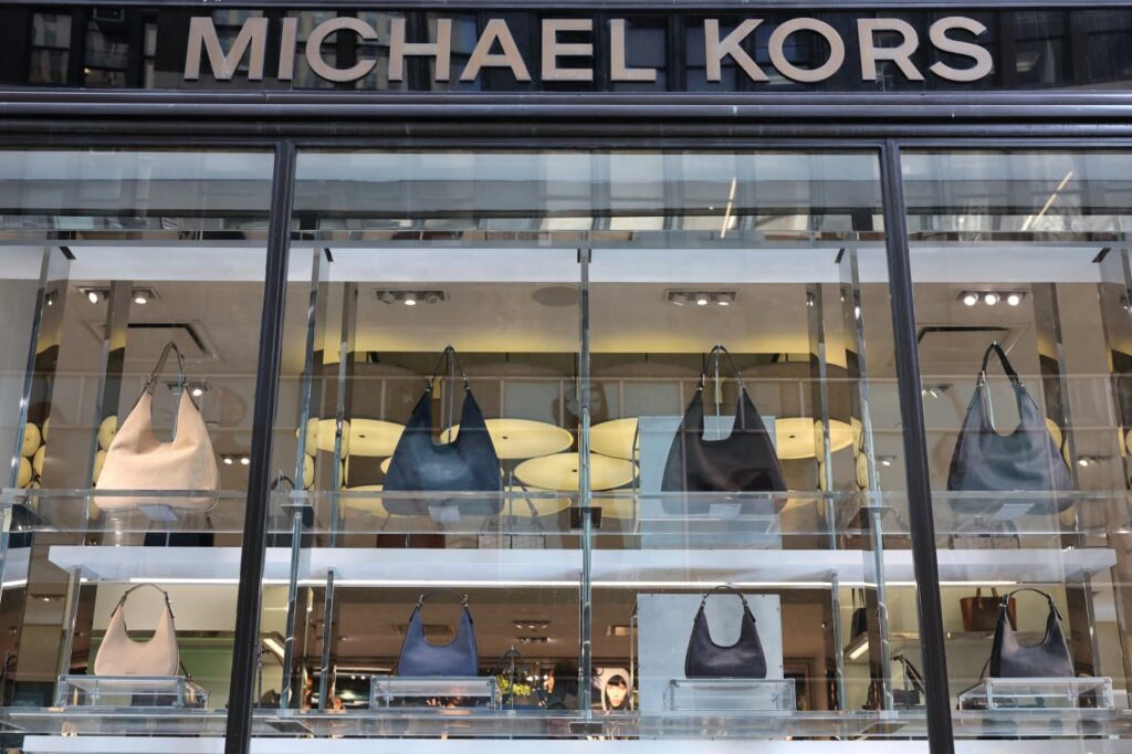 Stock of Michael Kors proprietor Capri dives forty five% after opt blocks merger with Tapestry