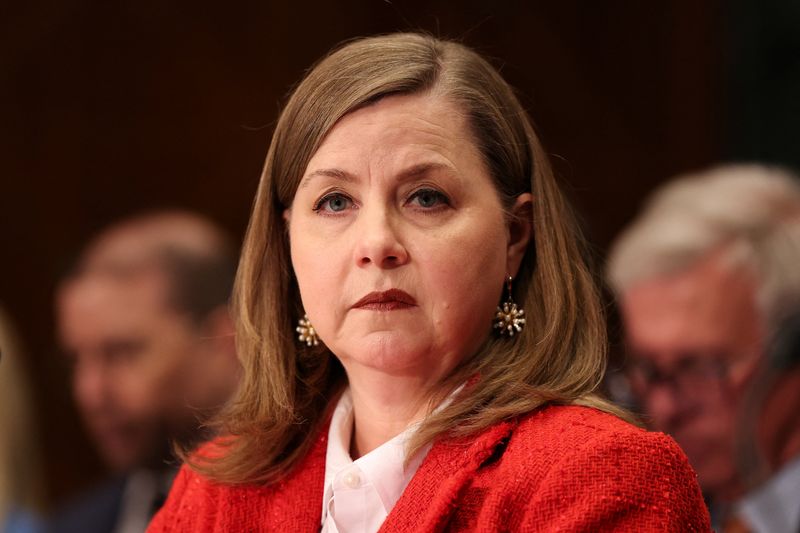Fed officials mull raising rates to curb rising inflation risk
